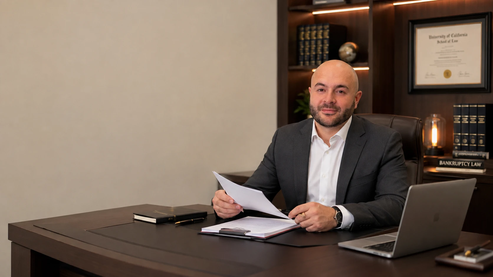 Марат Дзалаев за работой с документами